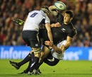New Zealand's Sonny Bill Williams attracts the attention of the Scotland defence
