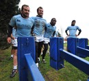 The South African front-row, Jannie du Plessis, Bismarck du Plessis and Tendai Mtawarira, prepare to pack down