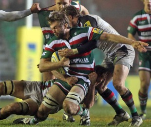 Leicester's Geoff Parling is felled by the Quins defence, Leicester Tigers v Harlequins, Aviva Premiership, Welford Road, Leicester, England, November 19, 2010 