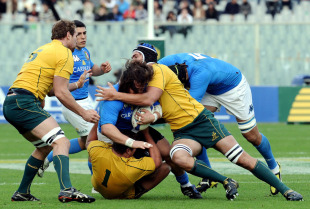 Italy's Martin Castrogiovanni is wrapped up by the Wallaby defence, Italy v Australia, Stadio Artemio Franchi, Florence, Italy, November 20, 2010