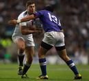 England's Matt Banahan is tackled by George Pisi