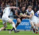 Exeter's Luke Arscott pierces the Leeds defence