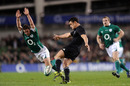 Eoin Reddan attempts to charge down Dan Carter's kick