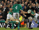 Sam Whitelock takes on the Irish defence