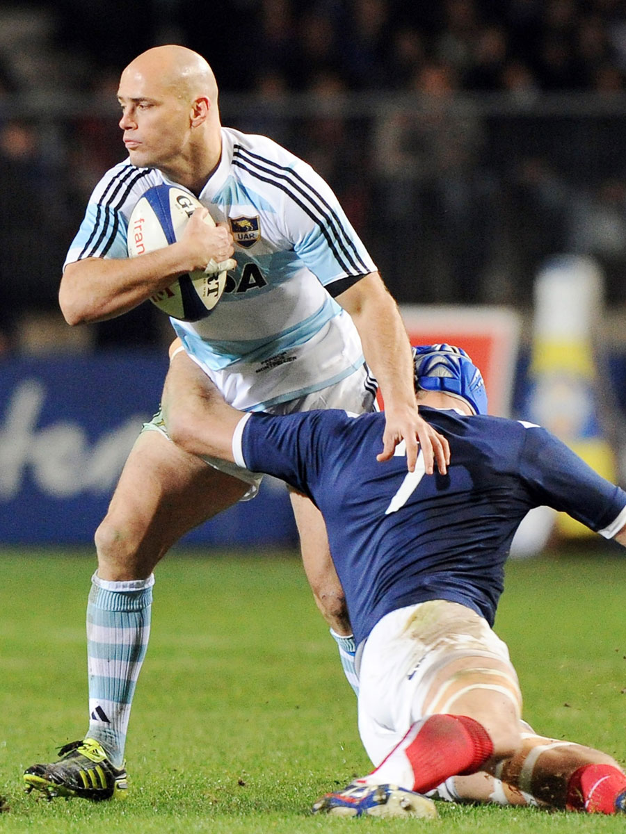 Felipe Contepomi tries to step out of the tackle, France v Argentina, Mosson Stadium, Montpellier, France, November 20, 2010