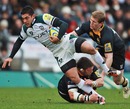 London Irish's Daniel Bowden is felled by the Wasps defence