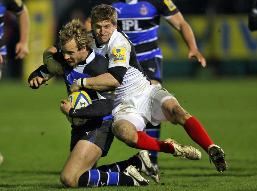 Bath's Nick Abendanon is tackled by Saracens' David Strettle