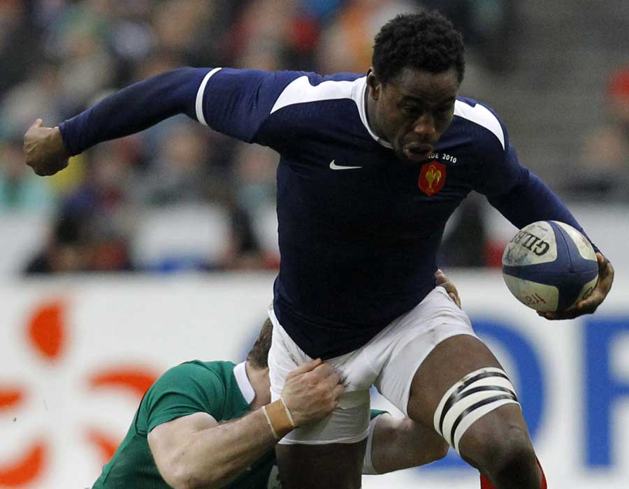France flanker Fulgence Ouedraogo breaks a tackle