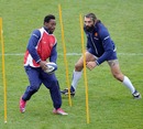 France flanker Fulgence Ouedraogo runs a drill with Sebastien Chabal