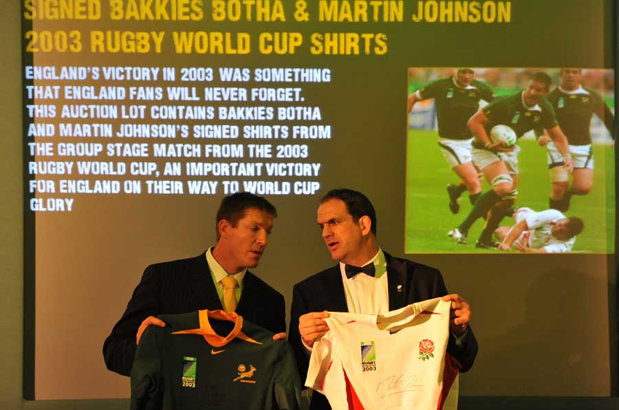 South Africa lock Bakkies Botha and England manager Martin Johnson prepare to auction shirts