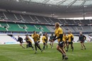 Adam Ashley-Cooper and Lachie Turner run a passing drill