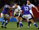 Sean Lamont challenges the Samoan defence