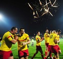 Romania celebrate victory over Uruguay