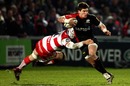 Nils Mordt is tackled by Gloucester's Dave Attwood