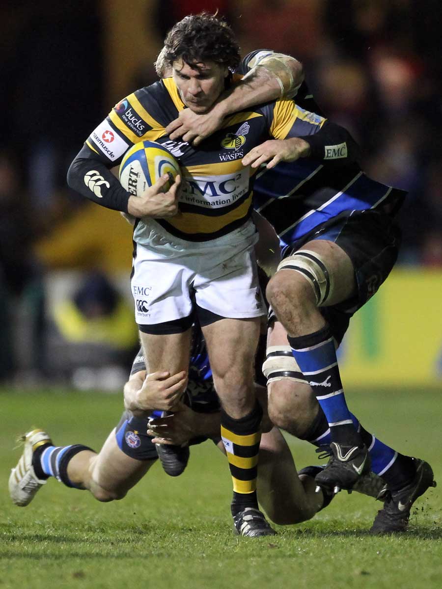 Ben Jacobs is shackled by Bath's defence