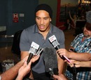 All Blacks wing Hosea Gear is interviewed upon landing in Auckland