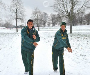 Springboks Gio Aplon and Elton Jantjies make the most of the winter weather, London, England, December 2, 2010