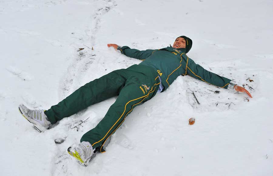 South Africa's Gio Aplon larks about in the snow