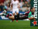 Danny Care of Quins celebrates scoring a try