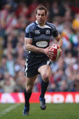 Chris Paterson of Scotland runs with the ball during the Six Nations match between Wales and Scotland at the Millennium Stadium in Cardiff, Wales on February 9, 2008.
