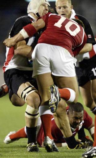Canada skipper Al Charron is tackled and accidentally injured by Pierre Hola of Tonga, Canada v Tonga, World Cup, Win Stadium, October 29 2003