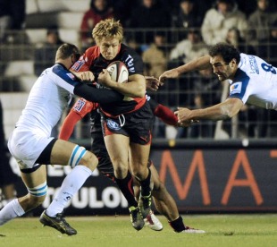 Toulon fly-half Jonny Wilkinson is wrapped up by the Montpellier defence, Toulon v Montpellier, Top 14, Stade Mayol, Toulon, France, December 3, 2010