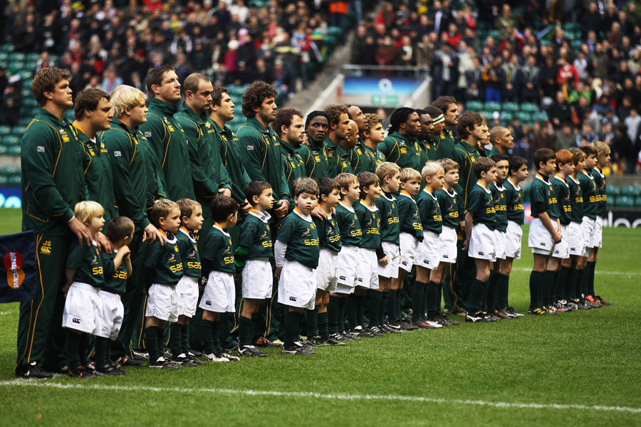 The South Africans line up for their national anthem
