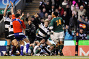 The Barbarians celebrate Quintin Geldenhuys' try
