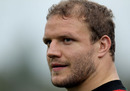 Prop Euan Murray looks on during training