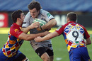 Matt Smith carries the ball at the Perpignan defence