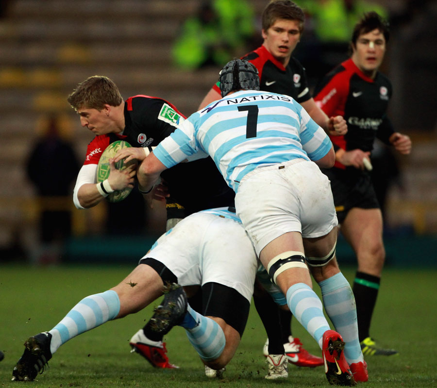 David Strettle is hit back by the Racing defence