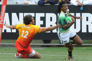 South Africa's Cecil Afrika goes outside England's Chris Cracknell, South Africa v England, George Sevens, IRB Sevens World Series, Outeniqua Park, George, South Africa, December 11, 2010
