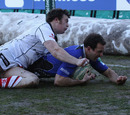 Bath's Matt Carraro dives over for the opening try