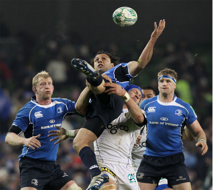 Leinster's Isa Nacewa is tackled by Clermont's Julien Pierre