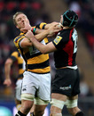 Wasps No.8 Andy Powell clashes with Saracens lock Steve Borthwick