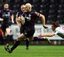 The Ospreys' Richard Fussell sprints past the opposition
