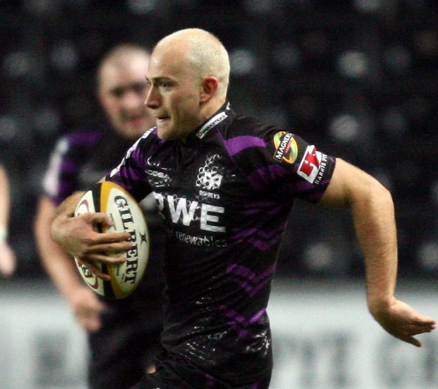 The Ospreys' Richard Fussell sprints past the opposition