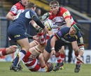 Leeds' Hendre Fourie off loads the ball under pressure