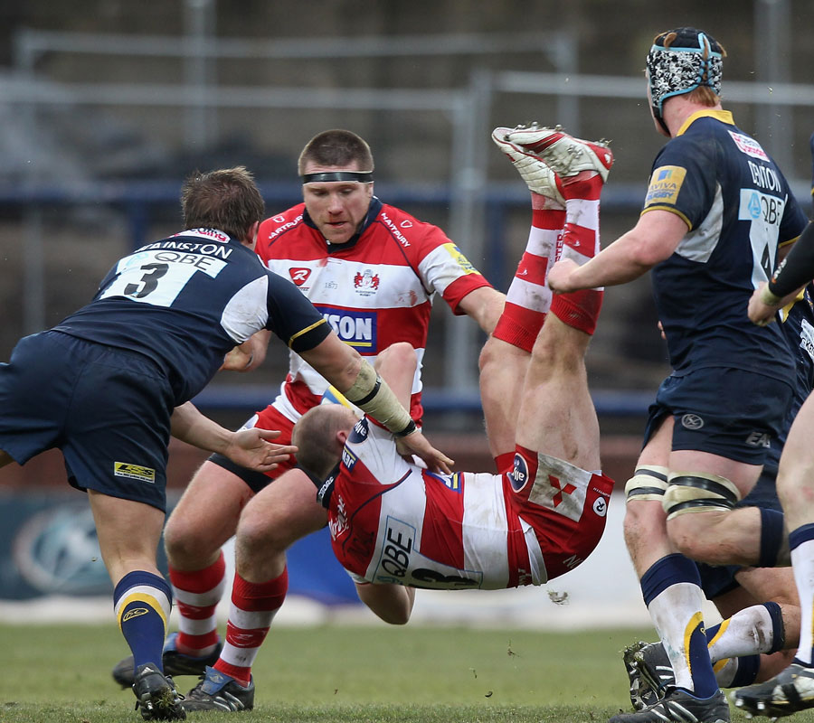 Gloucester's Mike Tindall is upended against Leeds