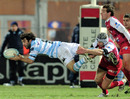 Racing Metro scrum-half Jerome Fillol looks to off-load in mid air