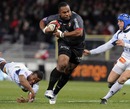 Toulouse's Rupeni Caucaunibuca exploits a gap in the Castres defence