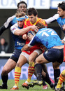 Perpignan fullback Jerome Porical is wrapped up by the Montpellier defence