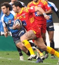 Perpignan's Farid Sid takes the ball to the Montpellier defence