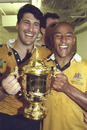 Australia's John Eales and George Gregan celebrate winning the World Cup