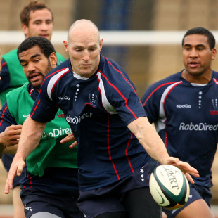 Melbourne Rebels centre Stirling Mortlock attempts to control the ball during training at AAMI Park, Melbourne, Australia, January 11, 2010