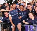 Danny Cipriani and Cooper Vuna celebrate the Rebels' victory over Tonga