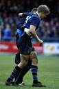 Bath's injured flanker Lewis Moody is helped from the field