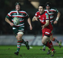 Scarlets fly-half Stephen Jones fires a pass out wide