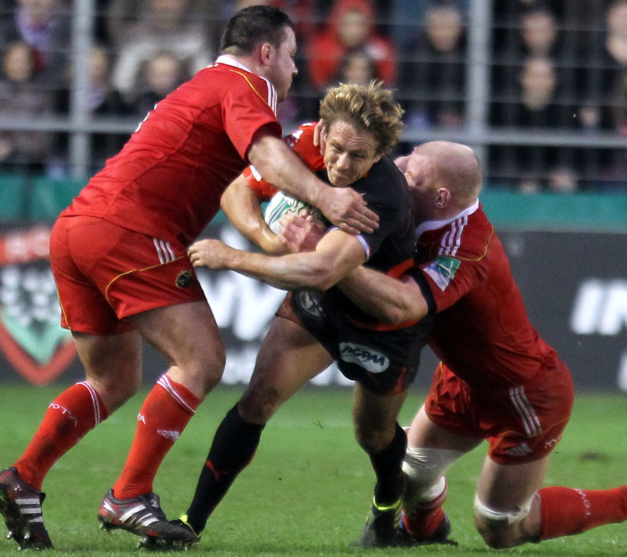 Toulon's Jonny Wilkinson challenges the Munster defence