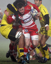 Gloucester's Henry Trinder stretches the Agen defence